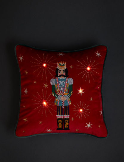 An Image of M&S Velvet Nutcracker Small Light Up Cushion