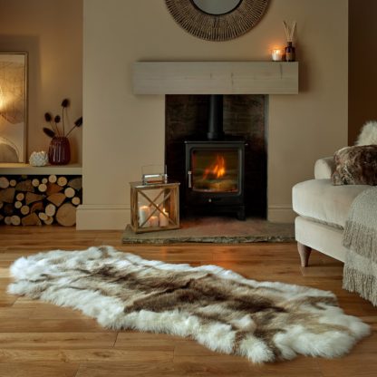 An Image of Reindeer Faux Fur Rug Natural