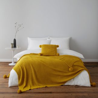 An Image of Pom Pom Ochre Knit Throw Ochre (Yellow)