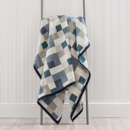 d3d50f667248008eac1cc16b0cb19c6d2e1fd3fd29d8279f593da0852d2f098e.jpg An Image of Thermosoft Mini Check Blue Throw Blue