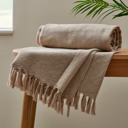 d61ff6e242a0e58cf1f401ec6c9766c9dce0c502da5b5404bf91107657b75a22.jpg An Image of Woven Throw Warm Sand