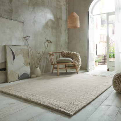 An Image of Rue Plait Border Wool Rug Natural