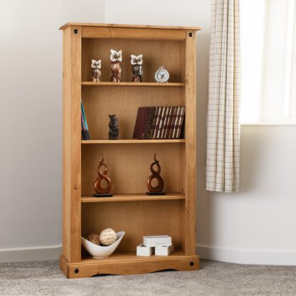 c9d6dc31a2e739c156309fa42e3c4cc7a41249293a58421fdb57e60ef771475b.jpg An Image of Corona Medium Bookcase Weathered Pine (Brown)