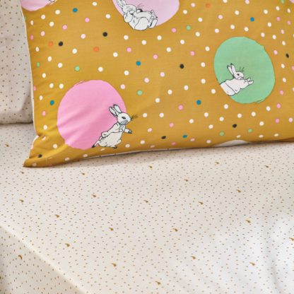 d698fc579bdb3827f24df80bdda3588b485a625fe71735afb44c86e237be4c3f.jpg An Image of Peter Rabbit Dotty Ochre Fitted Sheet Ochre