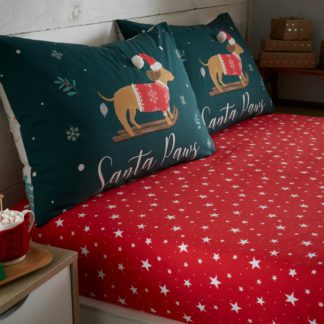 An Image of Catherine Lansfield Christmas Stars Fitted Sheet Red