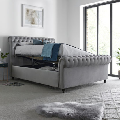 7d38c591b2639315230e947b6c7415ae52e7b37bbf2d175f16554d81f91b4d59.jpg An Image of Osborne Grey Velvet Ottoman Storage Bed Frame - 5ft King Size
