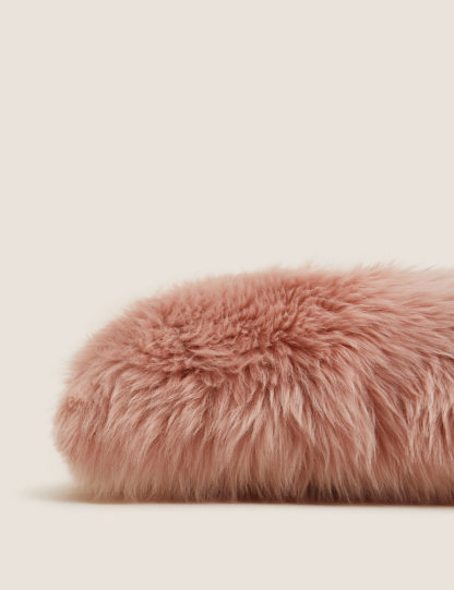 84b251da3b08442cb297eb31ca13c021b1f7802179d46db4080e7e0a702e09df.jpg An Image of M&S Sheepskin Cushion