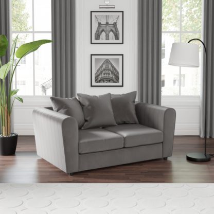 8636610ac36ff3c49c2cf9ce9c77fb65de9e830c16fb152a7868e06ad28c002f.jpg An Image of Blake Opulent Velvet Curved Arm Quilted 2 Seater Sofa Opulent Velvet Champagne
