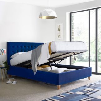 An Image of Kingham Blue Velvet Fabric Ottoman Storage Bed Frame - 4ft6 Double