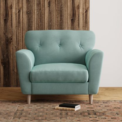 60f65350438793cfbe9361c846d7c570fe6a21ce07785aa7187dec7942cddb6a.jpg An Image of Sven Opulent Velvet Snuggle Chair Navy