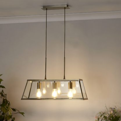 An Image of Bellevue 3 Light Industrial Pendant - Brass