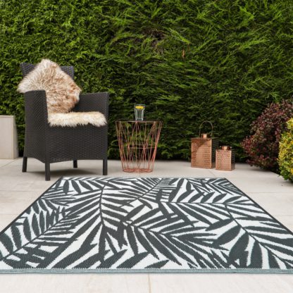 01d35294887a66c88224ba0f3a8a95587142e09b6a2056d4d9d51f8a3a840a3f.jpg An Image of JVL Leaves Reversible Plastic Woven Outdoor Rug Grey