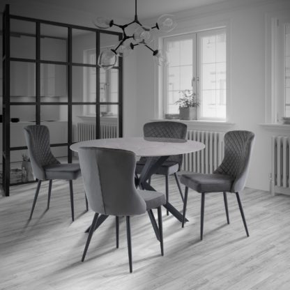 d6874d045a6b4a22cffe58c138ff34f180c7a94746a30378b6f9305c3748c413.jpg An Image of Talia Round 1.2m Dining Table Grey