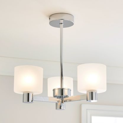 e2ce13b5f0d02bfd6ffc05774970f7563c772d2dd366f0d17ba9917e9a79549f.jpg An Image of Erin Frosted 3 Light Ceiling Fitting Chrome