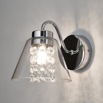 25c3bce39817f10a29ebdb9937019ede2eafc53bb131d886dc9c7654e3146c35.jpg An Image of Tyara Chrome Crystal Detail Wall Light Chrome