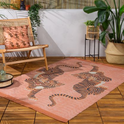 An Image of furn. Tibetan Tiger Coral Washable Indoor Outdoor Rug Orange