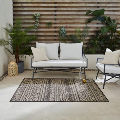 An Image of Amber Global Fibre Indoor Outdoor Rug Beige