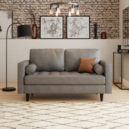 f331e3020e5186e3d5b991365e8a59e9b92bb20e87b2f6cd0a26c59d570383bb.jpg An Image of Zoe Distressed Faux Leather 2 Seater Sofa Grey