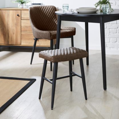 f8daa6df79ba0e03db81a1e49eb9bba03521fd723fea1b7ad72f394097934359.jpg An Image of Montreal Faux Leather Low Stool Montreal Brown