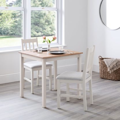 An Image of Coxmoor 4 Seater Rectangular Dining Table, Off White Solid Oak Cream