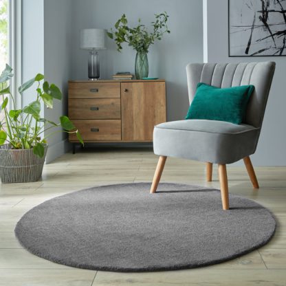48923599eea2bd5e65da71d5a0e363a96625165643daa57c7dac7a03eefec43d.jpg An Image of Isla Round Rug Navy Blue