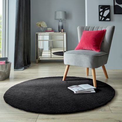 504da139d3bdef987353ba39b548bf498970a95a800f38185a5a63131d7afe4b.jpg An Image of Isla Round Rug Navy Blue