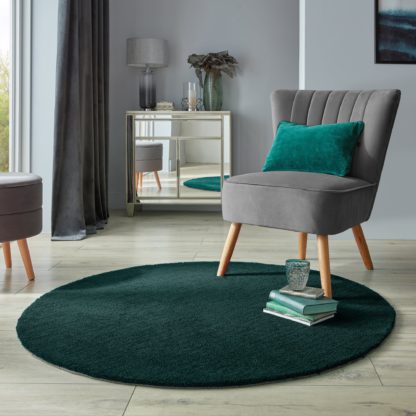 78d781b29ba4fff92e10d2d41ece9a2791f63618371de25bbb80886b9b7dc672.jpg An Image of Isla Round Rug Navy Blue