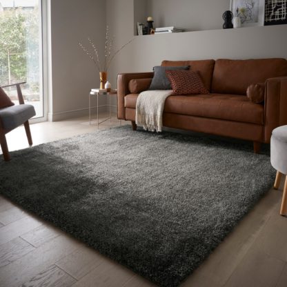 7dc9a5fcd18eb732ca75b3c155be669d760fbbfaee809e0adf690be96620321c.jpg An Image of Indulgence Square Rug Grey