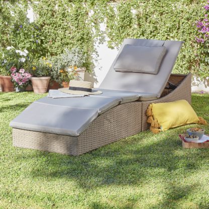 An Image of Natural Folding Rattan Sun Lounger