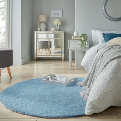 a0508a5bca5046f9399fbbaf31205bb7f4d3826d11973ae6eaa7b688f50b2f82.jpg An Image of Isla Round Rug Navy Blue