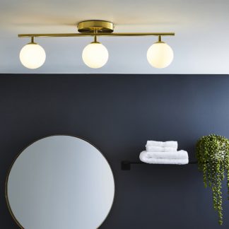 An Image of Toronto Satin Brass 3lt Bathroom Spotlight