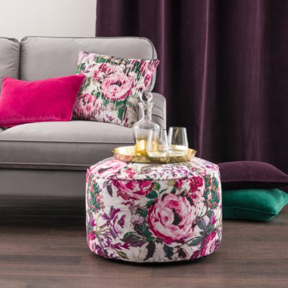 62eacb8ab3b54dd6974f1e510a2305137b6dbfc5fca739ac6fa71c8caa6d6c56.jpg An Image of Kinsley Floral Velvet Pouffe Pink