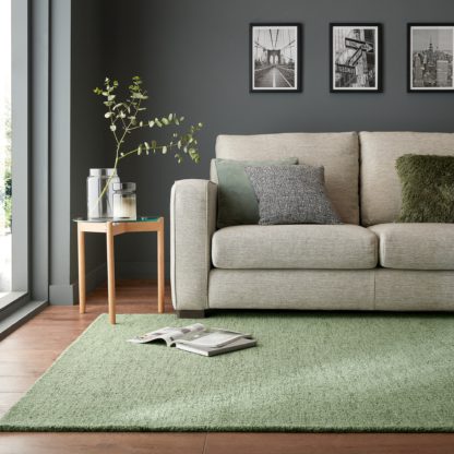 c5f0a23fa545cc24fa1fa16a50bb3dc7582196e53924ee5de8b2d1844bc572fb.jpg An Image of Alto Boucle Wool Rug Alto Olive