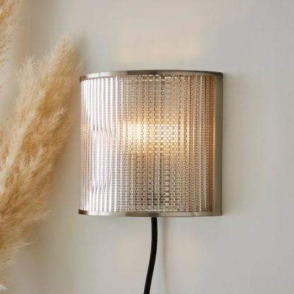 An Image of Kruze Plug In Wall Light Gold