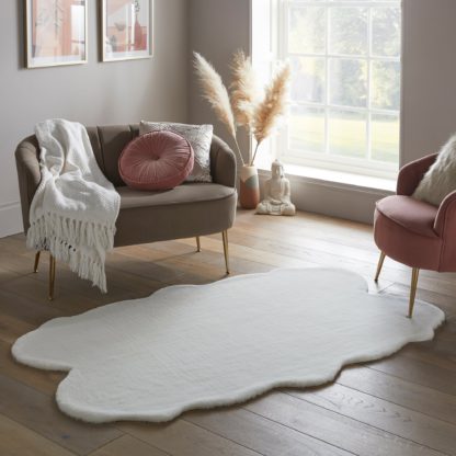 d1bcba8e516d22a1e825db3da455e441c3ea1891c01de344a6f1c6f32e2d48cc.jpg An Image of Supersoft Faux Fur Quad Rug Supersoft Ivory