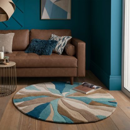 An Image of Round Splinter Rug Teal (Blue)