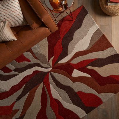 dd6284e6407bccde02bda11029ae4b0da311176db8ee919dd73748b55a95640b.jpg An Image of Splinter Rug Orange