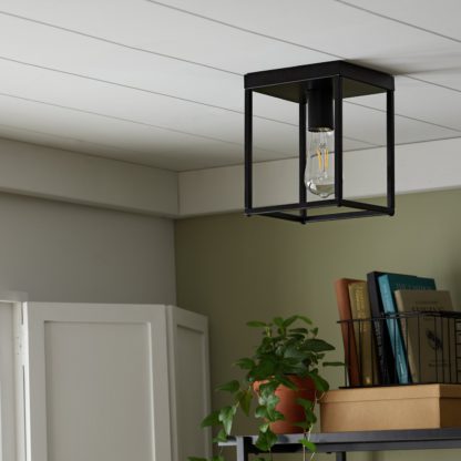 An Image of Habitat Carriage Metal Flush Ceiling Light - Matt Black