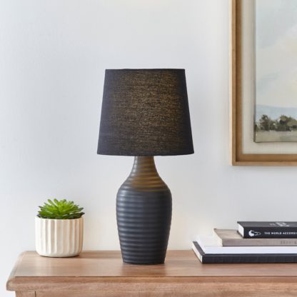 b958cc0d5adde383bdc9aa2153aeeac61d3144eb2ae95a1ccd9655fa54792416.jpg An Image of Luna Table Lamp White