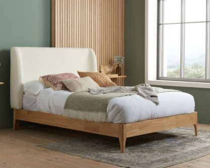 30d2b4c7ee2bc59ace2b04350828d1e091c856df2778014a6647430adcd8fcd5.jpg An Image of Halfden - Double - Boucle Winged Bed - White - Boucle Fabric - 4ft6