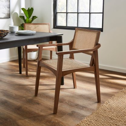 4c12c3287c32423f11a93f0f67e2ea9d074f2e8a44aec5e458d3abda448d7de6.jpg An Image of Giselle Carver Dining Chair Natural
