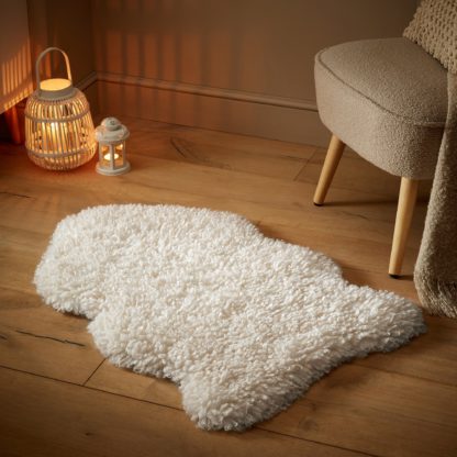 An Image of Curly Faux Fur Rug Green