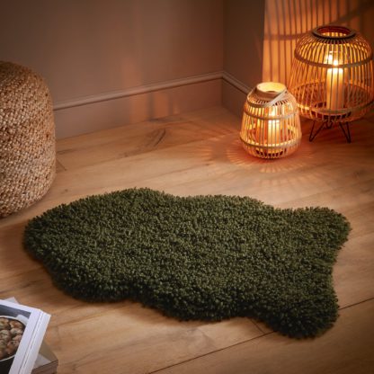 An Image of Curly Faux Fur Rug Green