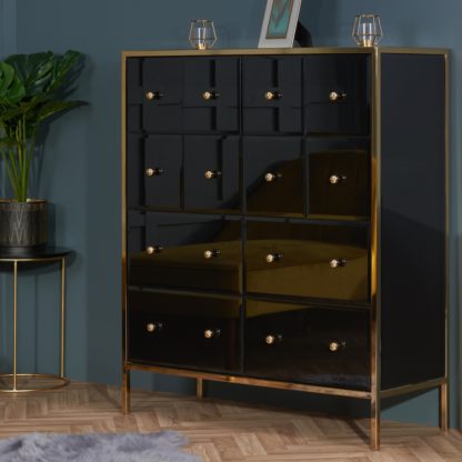 9f98a4a4038a106d8ea0e0d79739e5a0d75f4019cd4bb965ffbbab853fa147d7.jpg An Image of Fenwick - Merchant Chest - Black/Gold - Glass/Metal - Happy Beds