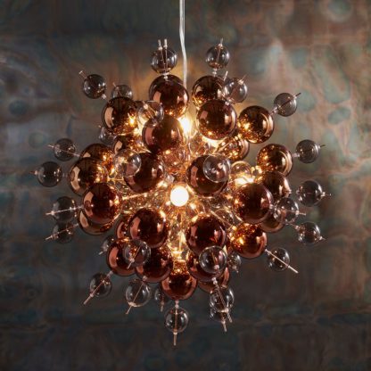 An Image of Vogue Andromeda 9 Light Pendant Light Copper