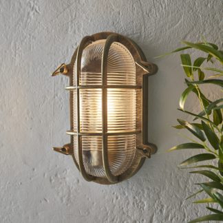 An Image of Bulkhead Outdoor Wall Light - Distressed Brass