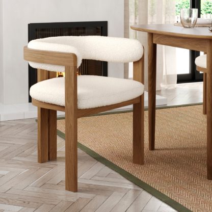68d25a3ec0b0906d83b3c0bea24a1b87a6ec0d0d008b64908887bbdee41bd9ef.jpg An Image of Lovato Dining Chair Natural