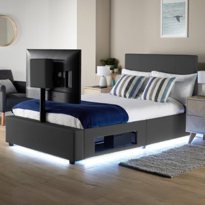43e9e4fd9e235b82f9123a1e7326e3d3e579de43dbd21824866c42eb37479356.jpg An Image of X Rocker Living Ava TV Bed with LED Lights and TV Mount Black