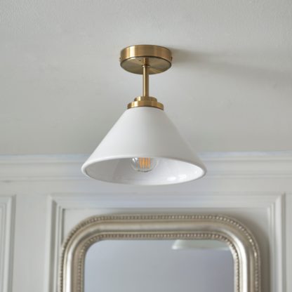 9b8a4ac3fbfb901455926666c5ed2477a1f5dfe2128eb19086b5030f25048fe2.jpg An Image of Celcy Bathroom Flush Ceiling Light White