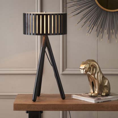 An Image of Rabanne Slatted Black Wood Tripod Table Lamp Black